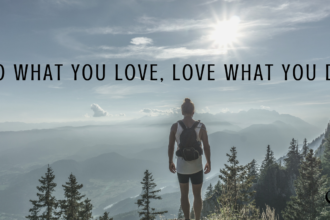 Image representing staying motivated during a pandemic | hiker summiting mountain | finding what you love