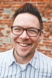 A photo of Jason Wilkinson is captured. Jason is the owner of a private mental health practice, Wellspace Counseling. He is featured on Practice of the Practice, a therapist podcast.