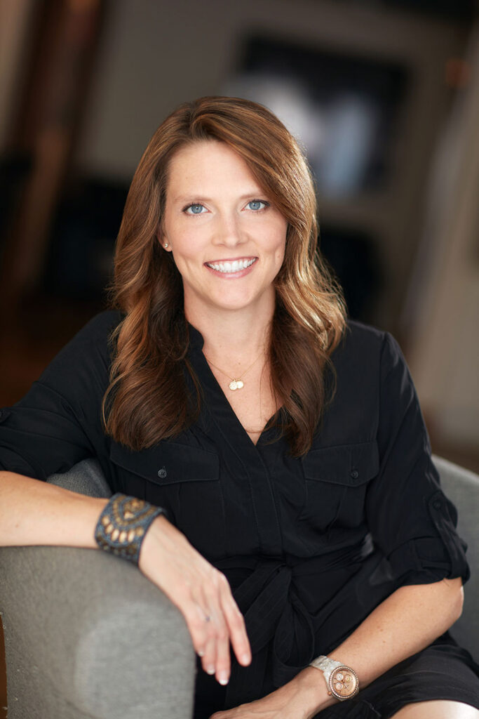 A photo of Michelle Puster is captured. She is a EFT Therapist and the owner of Katy Couples and Wellness Counselling. Michelle is featured on Practice of the Practice, a therapist podcast.