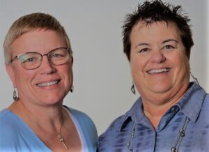 An image of Jill Johnson-Young and Sherry Shockey-Pope is captured. The are co-owners of Central Counseling Services in Riverside, Murrieta and Corona California, and the non-profit, a non profit, CCS Wellness. Jill and Sherry are featured on Grow a Group Practice, a therapist podcast.