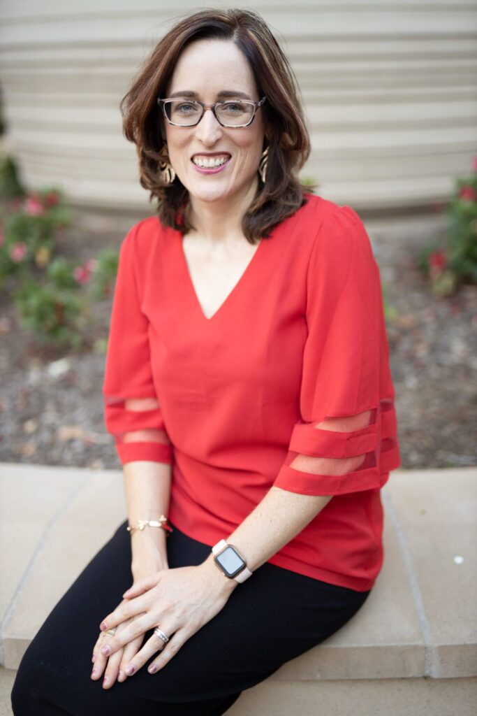 A photo of Lauren Sweeney is captured. She is a leadership, growth and business consultant at Rise Up For You. Lauren is featured on the Practice of the Practice, a therapist podcast.