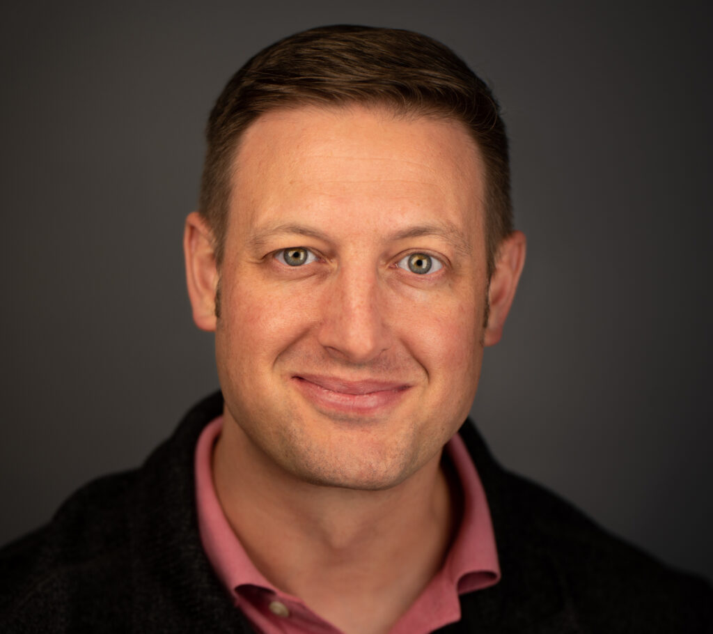 A photo of Nate Page is captured. He is the owner of Group Therapy Central as well as Northfield Dynamic Therapy. Nate is featured on the Practice of the Practice, a therapy podcast.