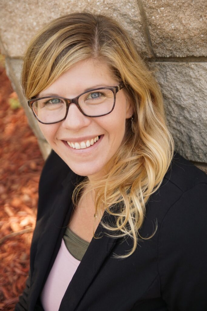A photo of Nicole Ball is captured. She is the owner of Mental Wellness Counseling and a Professor of Social Work. Nicole is featured on the Practice of the Practice, a therapist podcast.