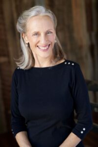 A photo of Dr. Katie Nall is captured. She is Tedx Speaker, and Master Trainer and Certified Practitioner in Emotional Freedom Technique (EFT) with additional training in trauma, quantum, and picture EFT. Dr. Nall is featured on the Practice of the Practice, a therapist podcast.