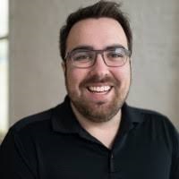 A photo of JJ Reynolds is captured. He is the head of marketing and analytics at Mediauthentic. JJ is featured on Marketing a Practice, a therapist podcast.